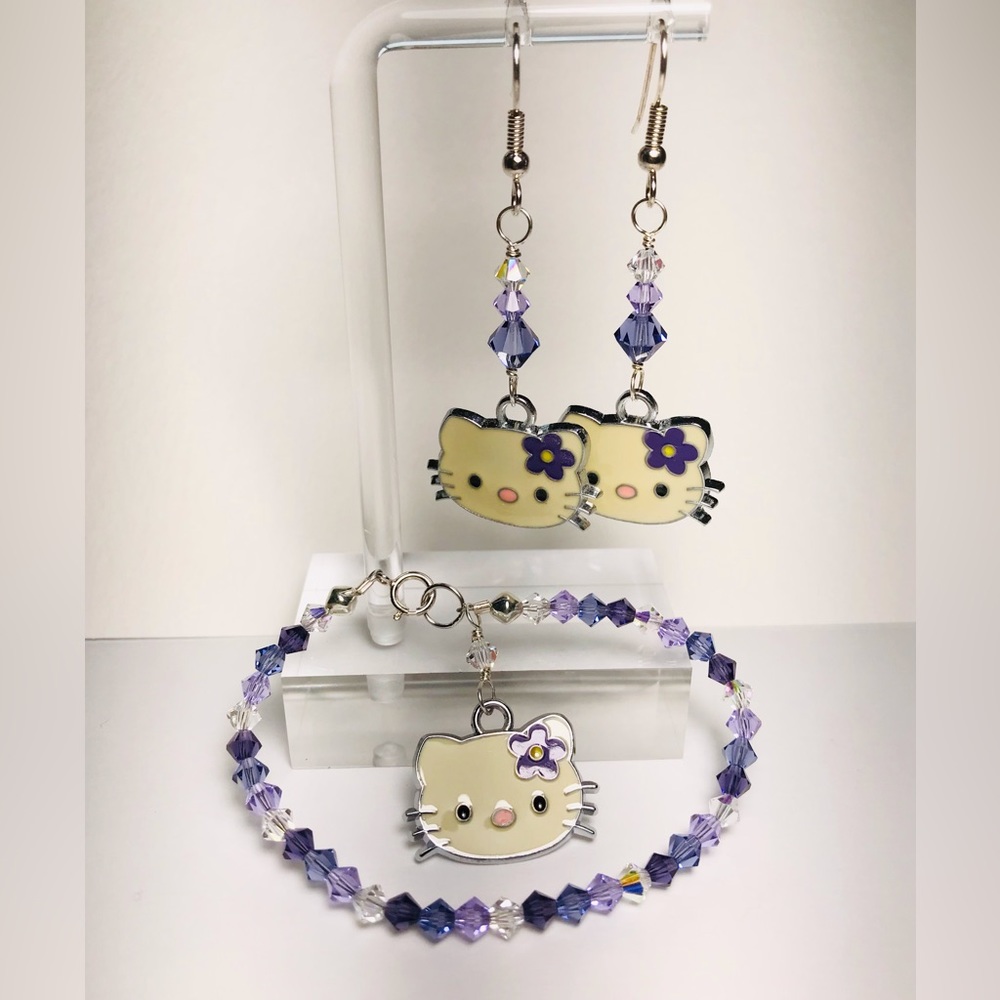 Beautiful handcrafted purple Hello Kitty bracelet and earrings set